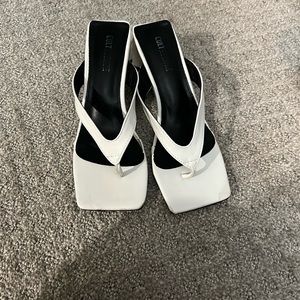 White heeled sandals